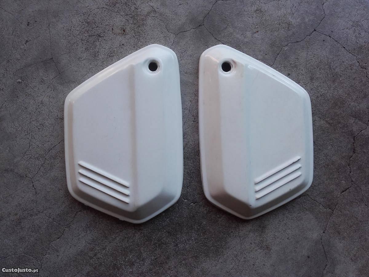 Tampas laterais casal 125