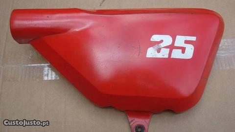 tampa lateral direita casal 125